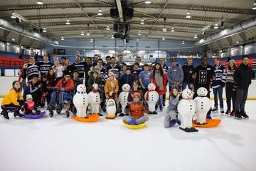 visually impaired ice hockey session attendees
